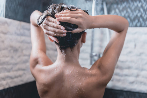 Back View of Beautiful Naked Young Woman in Shower - Fotoğraf, Görsel