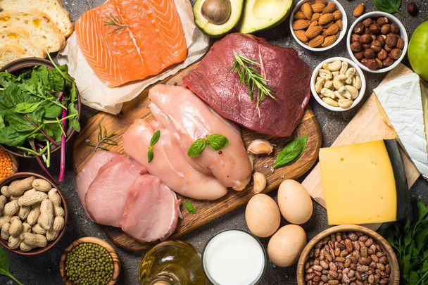 Protein sources - meat, fish, cheese, nuts, beans and greens. - Photo, Image