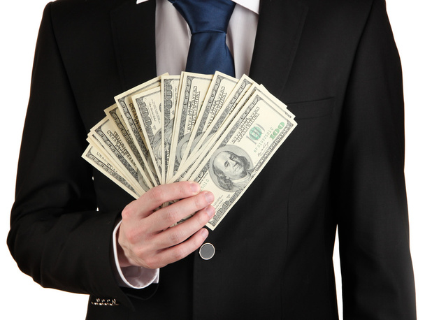 Business man holds lot of money isolated on white - Photo, Image