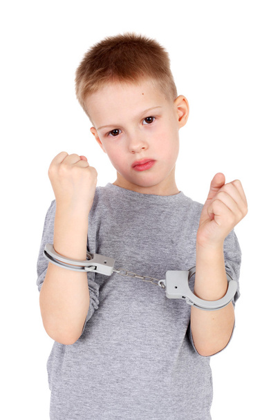 boy with the hand cuffs - Foto, afbeelding
