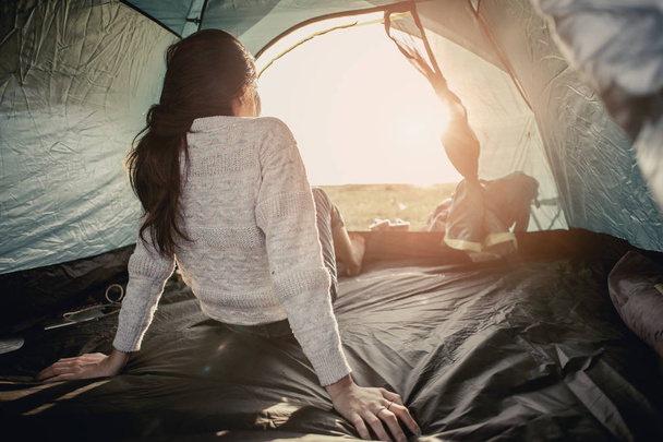 Women lie in tents.at camp. - Foto, imagen