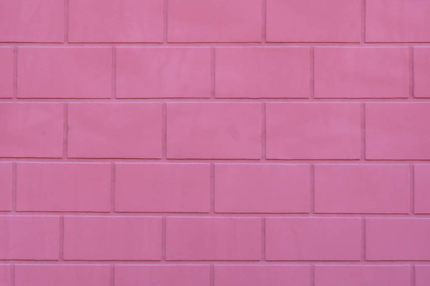 artificial pink wall texture from large blocks like bricks. Glamorous background for fashion magazine - Photo, Image