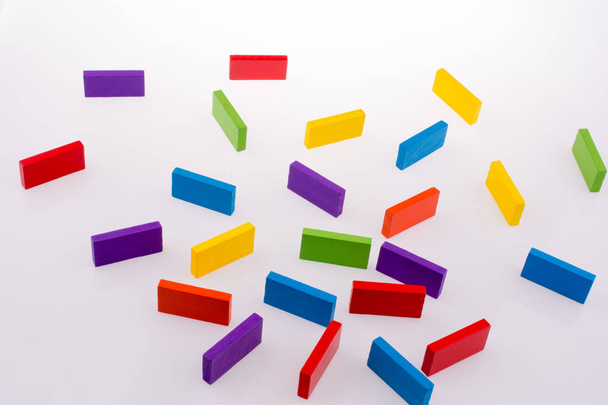 Color dominoes on a white background - 写真・画像