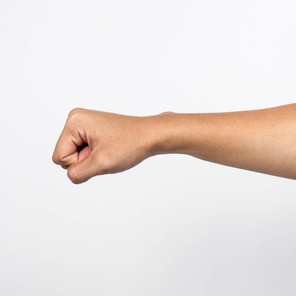 Hand with clenched a fist, isolated on a white background - Foto, imagen