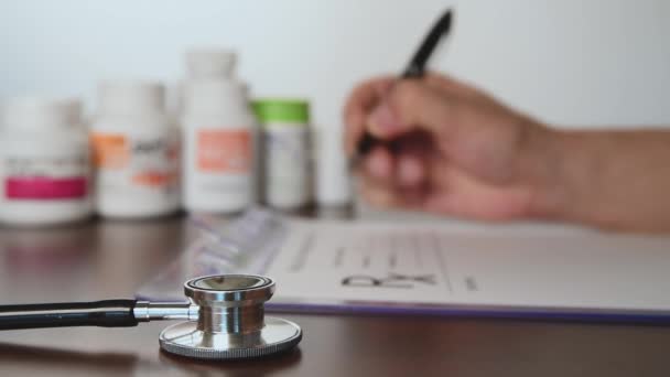 Doctor writing rx prescription. Healthcare concept. - Footage, Video