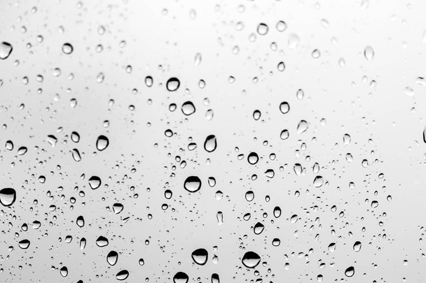 Regen druppels op het glas, achtergrond - Foto, afbeelding
