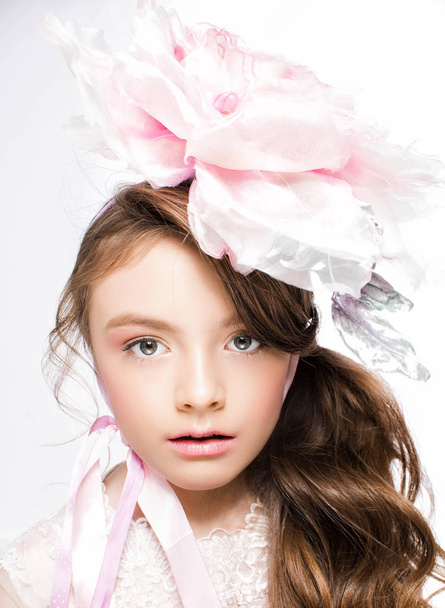 young beautiful girl in pink dress - Fotó, kép