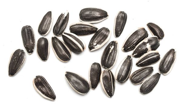 семена подсолнечника на белом фоне
  - Фото, изображение
