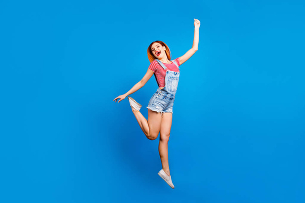 Ha-ha people person concept. Full length size body studio photo portrait of satisfied glad nice sweet lovely with beaming smile girl jumping up raising hands up isolated bright background - Valokuva, kuva
