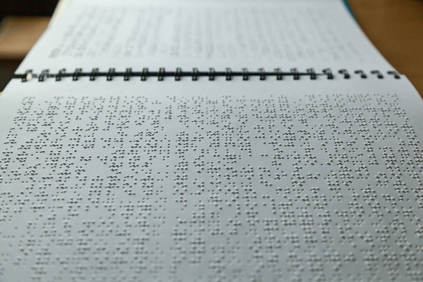 Page written in braille alphabet for blind people - Valokuva, kuva