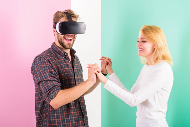 Prepare wedding dance. I like way you move. Found out how to teach him dance. Virtual reality dance school. Man vr glasses dancing with happy girl. Learn movement from cyber teacher in virtual school - 写真・画像