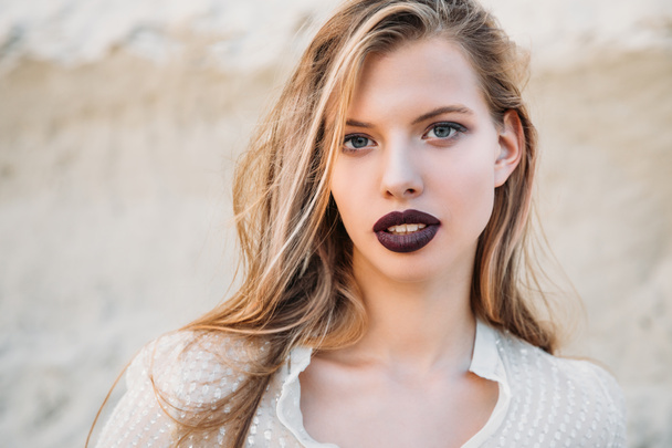 beautiful blonde girl with dark lipstick - Fotó, kép