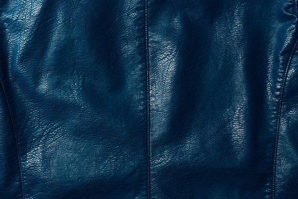 elevated view of dark blue leather shiny textile as background  - Photo, Image