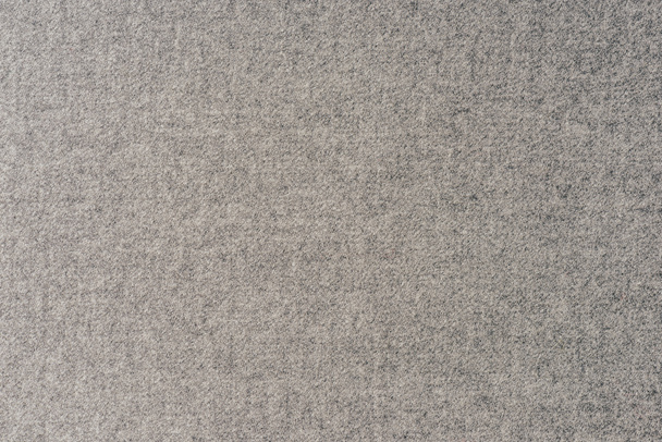 felülnézet szürke textil háttereként  - Fotó, kép