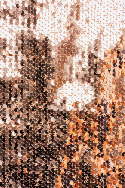 felülnézet bézs textil a csillogó flitterekkel, mint háttér  - Fotó, kép
