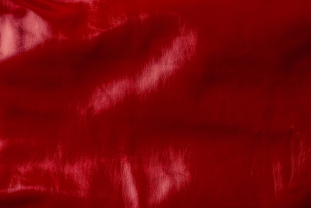 vue du dessus du textile rouge brillant comme fond
  - Photo, image
