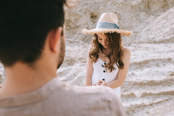 beautiful young couple in sand canyon, selective focus - Foto, Bild