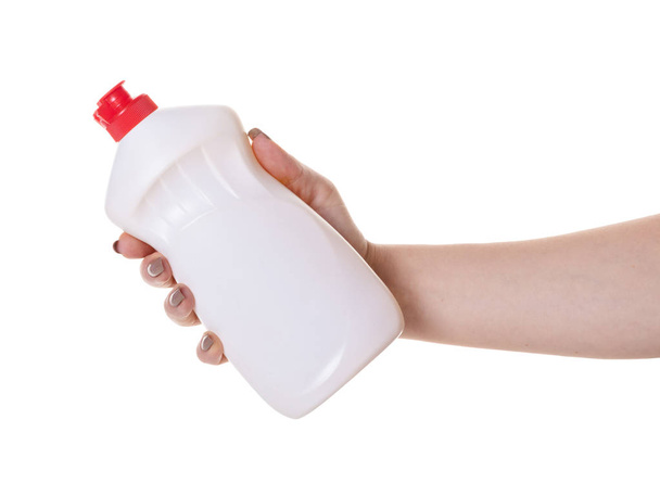 bottle with detergent in hand on white isolated background - Foto, Imagen