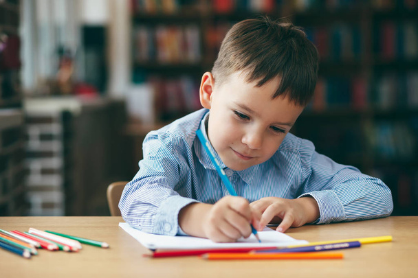 Preschool boy drawing - Фото, изображение