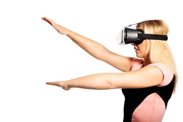 Woman with VR device - Фото, изображение