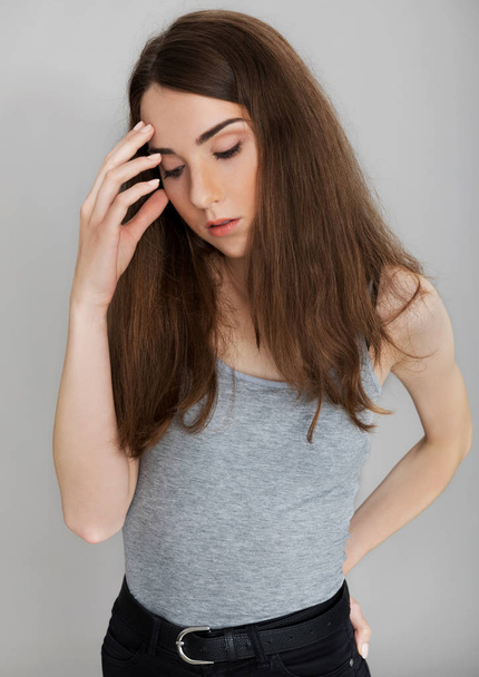 Young woman with headache. - Foto, Imagen
