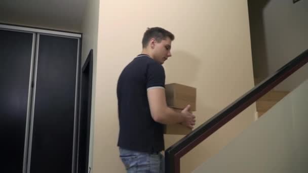 Young couple climbs the stairs - Video