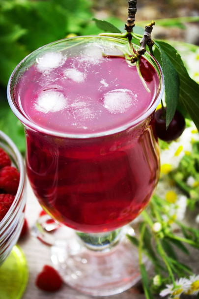 fruit juice with ice and raspberries - Photo, Image