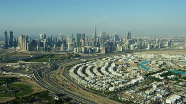 Aerial view Burj Khalifa city suburbs and commercial area modern vehicle transport highway United Arab Emirates Middle East Dubai  - Footage, Video