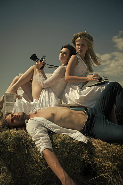 Man or macho lying on hay - Valokuva, kuva