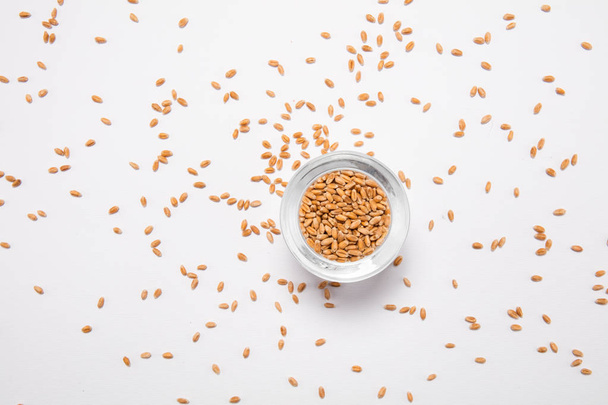 Macro view of natural organic wheat grain beans on background - Foto, Imagen