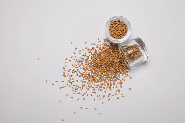 Macro view of natural organic wheat grain beans on background - Foto, Imagen