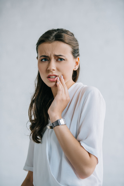 attractive young woman suffering from tooth pain  - Foto, imagen