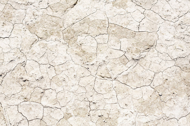Cracked earth after a drought - Fotó, kép
