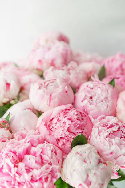 pink peonies . Floral composition, daylight. Wallpaper. Lovely flowers in glass vase. Beautiful bouquet - Photo, Image
