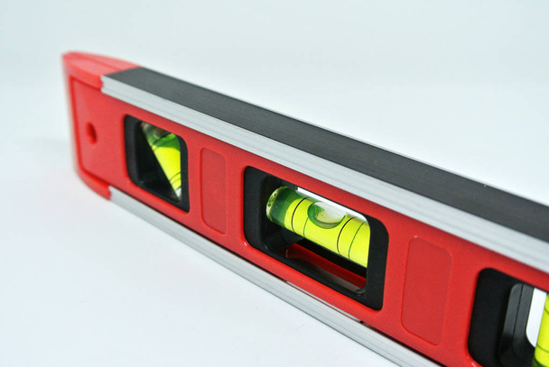 Spirit level tool for carpenter of contractor to determine object levels - Photo, Image