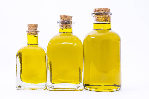 bottles of extra virgin olive oil isolated - Фото, зображення