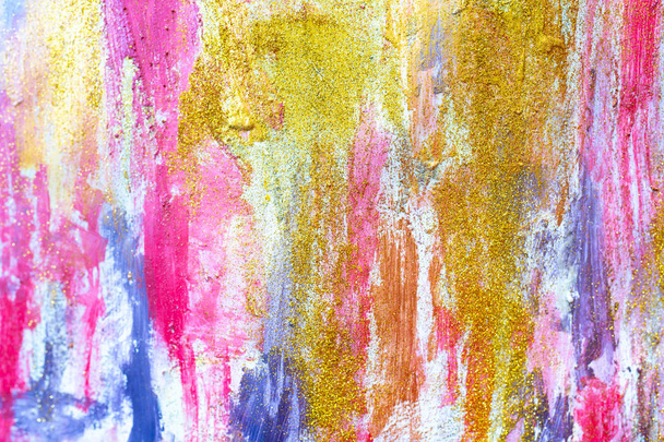 Abstract streams of paints on the wall. Modern textured arts. Paint stream. Bright colours bright yellow pink gold glitter golden shiny gouache oil watercolor. Dynamic color drops design. Paper board  - 写真・画像