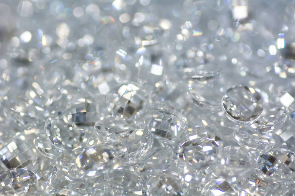 Closeup of many small white zirconia gemstones. Bright luxury background. - Photo, Image