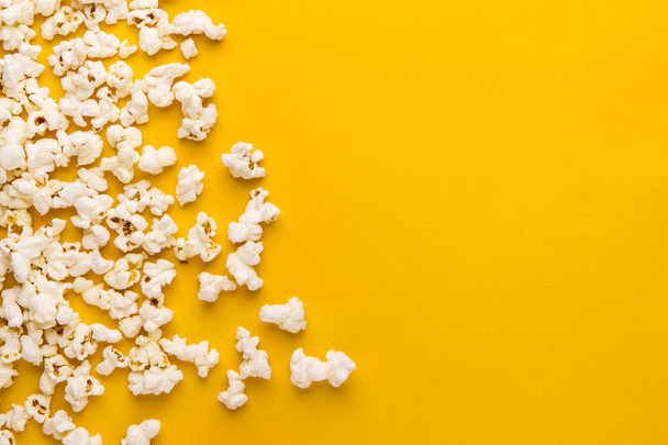 popcorn on a yellow background - 写真・画像