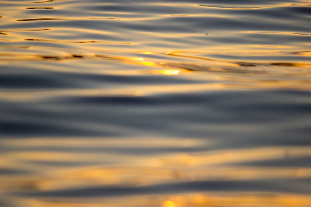 Blur tropical sunset beach. blurred water background - Fotó, kép