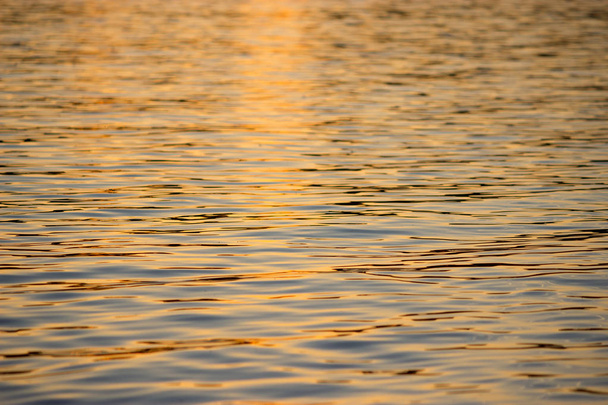 Isolated close-up of ripples on the surface of the river - Photo, Image