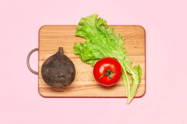 One Fresh Green Lettuce Near Beet And One Tomato - 写真・画像