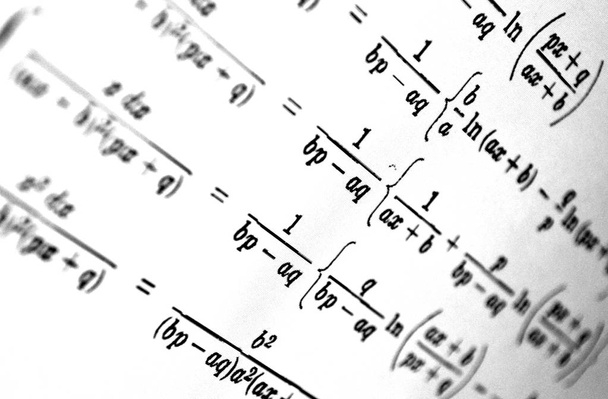 Large number of mathematical formulas on a white background - Photo, Image