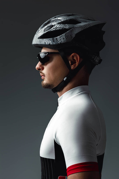 portrait of cyclist wearing helmet - Zdjęcie, obraz