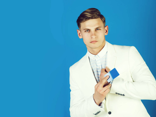 Businessman posing in white jacket and shirt - Foto, immagini