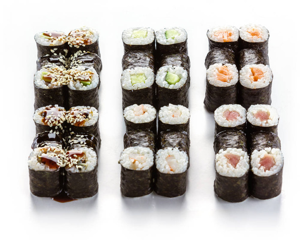 Set of various maki rolls over white background - Valokuva, kuva