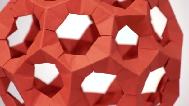 Close up red rotating modular origami. - Footage, Video