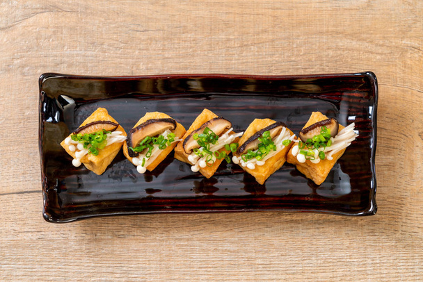 Grilled Tofu with Shitake Mushroom and Golden Needle Mushroom - healthy, vegan or vegetarian food style - Photo, image