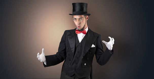 Magician holds something invisible  - Foto, Imagem