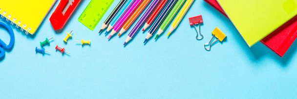 School and office supplies on blue background. - Foto, immagini